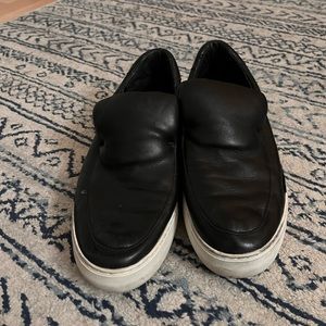 Black slip on leather sneakers